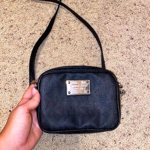 Michael Kors black satchel. Gently used